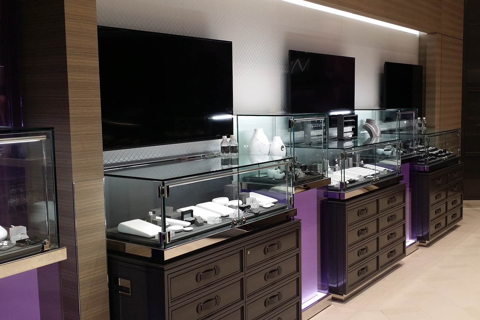 Metalsmiths wall units with glass museum displays